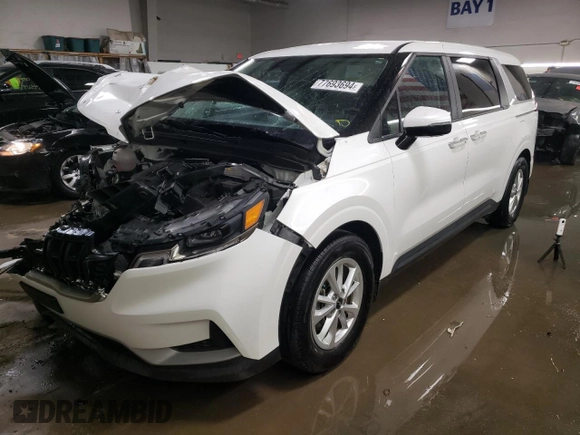 2023 Kia Carnival LX with VIN KNDNB4H39P6245635, listed as a Copart auction lot 77693694 with 26,752 mi miles and Salvage Title. Bid and sale history available at carsss.com. Image 1.