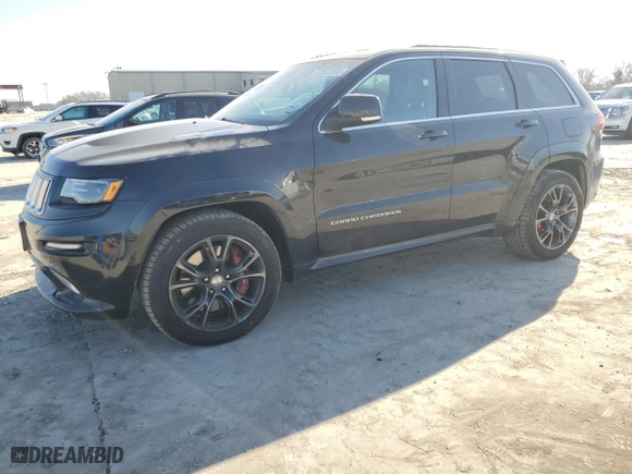 2015 Jeep Grand Cherokee SRT with VIN 1C4RJFDJ7FC613234, listed as a Copart auction lot 47537205 with 125,275 mi miles and Clean Title. Bid and sale history available at carsss.com. Image 1.