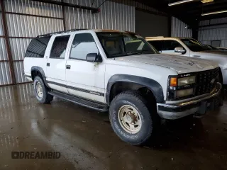 1992 Chevrolet Suburban z VIN 1GNGK26K8NJ330202, wystawiony jako Copart lot #85204074 z przebiegiem 266 388 mil mil oraz Czysty tytuł • Clean title. Historia ofert i sprzedaży dostępna na DreamBid. Obrazek 4.