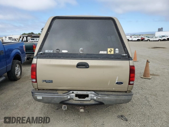 2000 Ford F-150 XL with VIN 1FTRX17L3YKB07018, listed as a Copart auction lot 66998714 with 0 mi miles and Salvage Title. Bid and sale history available at carsss.com. Image 6.
