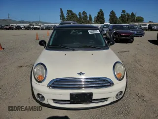 2010 MINI Hardtop with VIN WMWMF3C5XATZ66863, listed as a Copart auction lot 55695585 with 59,294 mi miles and Clean Title. Bid and sale history available at DreamBid. Image 5.
