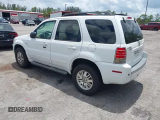 2006 Mercury Mariner Luxury with VIN 4M2YU56116KJ14472, listed as a IAAI auction lot 42349564 with 96,221 mi miles and . Bid and sale history available at DreamBid. Image 3.