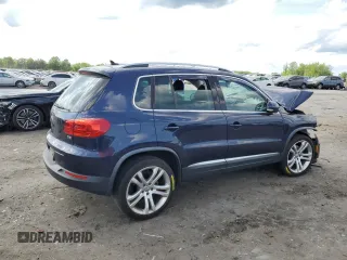 2016 Volkswagen Tiguan SEL with VIN WVGAV7AXXGW555809, listed as a Copart auction lot 55177805 with 40,676 mi miles and Salvage Title. Bid and sale history available at DreamBid. Image 3.