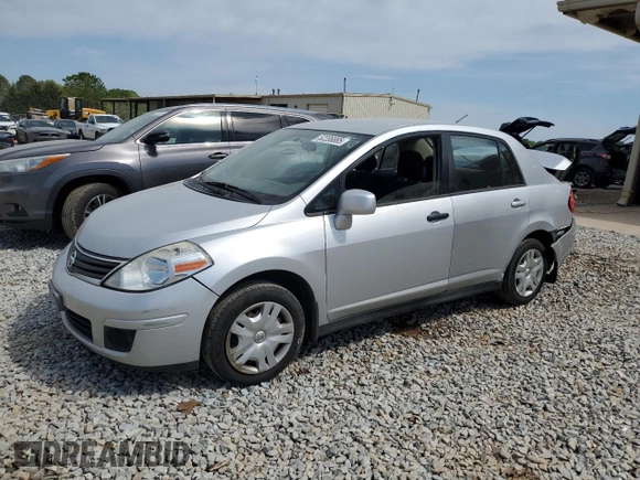 2011 Nissan Versa S with VIN 3N1BC1AP3BL452650, listed as a Copart auction lot 52206885 with 168,427 mi miles and Salvage title. Bid and sale history available at DreamBid. Image 1.