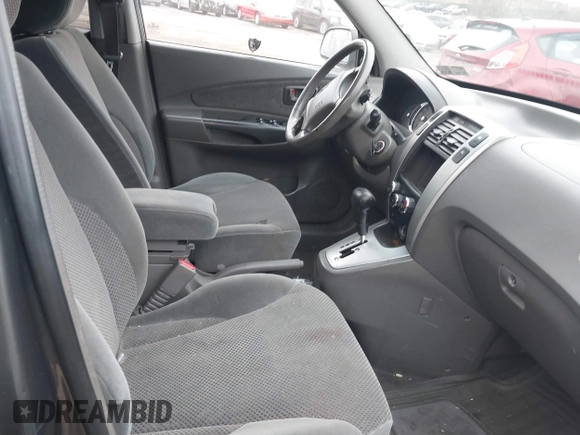2007 Hyundai Tucson SE with VIN KM8JN12D57U522679, listed as a IAAI auction lot 41891506 with 223,190 mi miles. Bid and sale history available at carsss.com. Image 5.