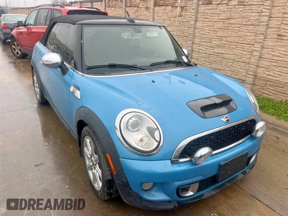 2014 MINI Convertible S z VIN WMWZP3C57ET706977, wystawiony jako Copart lot #45777855 z przebiegiem 77 175 mil mil oraz Czysty tytuł • Clean title. Historia ofert i sprzedaży dostępna na DreamBid. Obrazek 1.