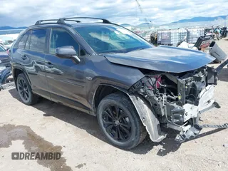 2022 Toyota RAV4 Hybrid SE with VIN JTM16RFV0ND070012, listed as a IAAI auction lot 42244604 with 22,740 mi miles and . Bid and sale history available at DreamBid. Image 1.