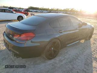 2015 BMW M6 z VIN WBS6C9C52FD468030, wystawiony jako Copart lot #81739974 z przebiegiem 66 861 mil mil oraz Szkoda całkowita • Salvage title. Historia ofert i sprzedaży dostępna na DreamBid. Obrazek 3.