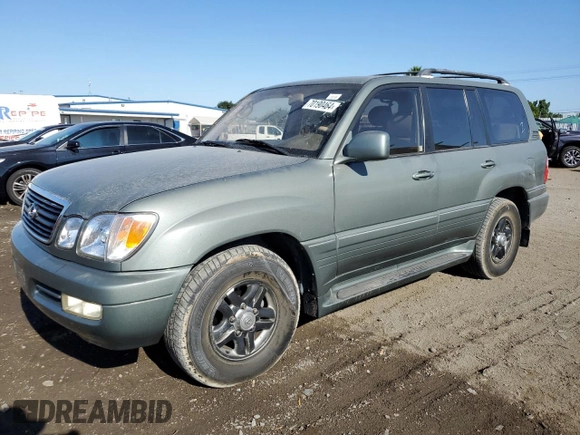 2002 Lexus LX 470 z VIN JTJHT00W723519186, wystawiony jako Copart lot #70190464 z przebiegiem 306 793 mil mil oraz Tytuł czysty. Historia ofert i sprzedaży dostępna na DreamBid. Obrazek 1.