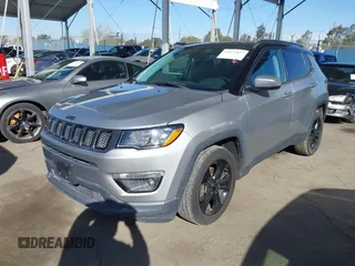 2020 Jeep Compass Latitude w/Sun/Safety Pkg with VIN 3C4NJCBB1LT102627, listed as a IAAI auction lot 41657827 with 68,371 mi miles. Bid and sale history available at carsss.com. Image 2.