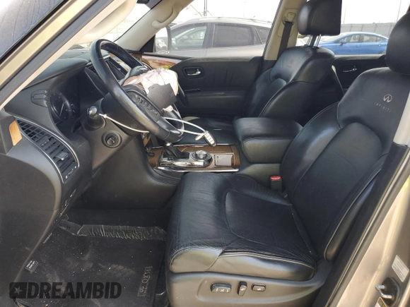 2012 Infiniti QX56 7-passenger with VIN JN8AZ2NE9C9016258, listed as a Copart auction lot 71570824 with 142,859 mi miles and Salvage Title. Bid and sale history available at carsss.com. Image 7.