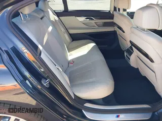 2016 BMW 7 Series 740i with VIN WBA7E2C52GG548048, listed as a IAAI auction lot 41701806 with 72,680 mi miles. Bid and sale history available at carsss.com. Image 8.