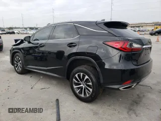2020 Lexus RX with VIN 2T2AZMAAXLC151541, listed as a Copart auction lot 82601054 with 54,629 mi miles and Salvage Title. Bid and sale history available at carsss.com. Image 2.