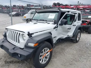 2023 Jeep Wrangler Willys z VIN 1C4HJXDG9PW545749, wystawiony jako IAAI lot #42307373 z przebiegiem 44 176 mil mil oraz . Historia ofert i sprzedaży dostępna na DreamBid. Obrazek 2.