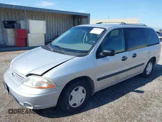 2003 Ford Windstar LX with VIN 2FMZA51463BB80988, listed as a IAAI auction lot 42191972 with 205,338 mi miles and . Bid and sale history available at carsss.com. Image 2.