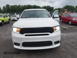 2014 Dodge Durango SXT with VIN 1C4RDJAG0EC561950, listed as a IAAI auction lot 42650331 with 106,959 mi miles and . Bid and sale history available at DreamBid. Image 13.