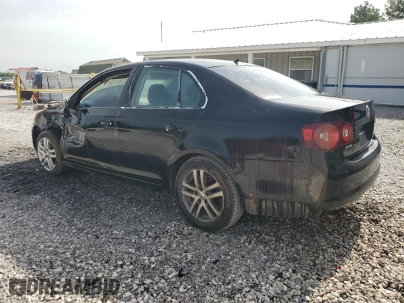 2009 Volkswagen Jetta S z VIN 3VWJM71K39M165677, wystawiony jako Copart lot #56901665 z przebiegiem 202 632 mil mil oraz Czysty tytuł • Clean title. Historia ofert i sprzedaży dostępna na DreamBid. Obrazek 2.