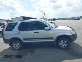 2004 Honda CR-V EX with VIN SHSRD78824U215572, listed as a IAAI auction lot 41932932 with 197,003 mi miles and . Bid and sale history available at carsss.com. Image 14.