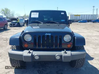 2010 Jeep Wrangler Unlimited Sahara with VIN 1J4HA5H17AL140941, listed as a IAAI auction lot 42004203 with 126,100 mi miles. Bid and sale history available at carsss.com. Image 11.