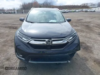 2019 Honda CR-V Touring with VIN 2HKRW2H9XKH636354, listed as a IAAI auction lot 41902615 with 66,781 mi miles and . Bid and sale history available at DreamBid. Image 12.