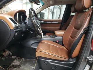 2012 Jeep Grand Cherokee Overland with VIN 1C4RJFCG0CC248462, listed as a Copart auction lot 46648895 with 99,479 mi miles and Salvage Title. Bid and sale history available at carsss.com. Image 7.