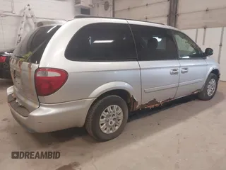 2005 Chrysler Town & Country LX с VIN 2C4GP44RX5R402180, выставлен на аукционе IAAI как лот 42062043 с пробегом 239 327 миль миль и . История ставок и продаж доступна на DreamBid. Изображение 4.