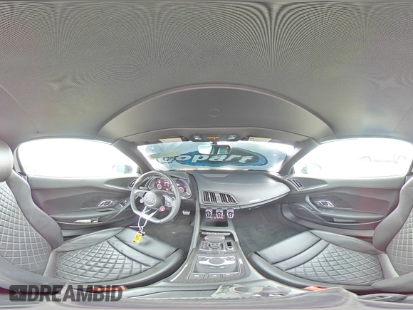 2018 Audi R8 z VIN WUAVACFX8J7900987, wystawiony jako Copart lot #45409684 z przebiegiem 6572 mil mil oraz . Historia ofert i sprzedaży dostępna na DreamBid. Obrazek 14.