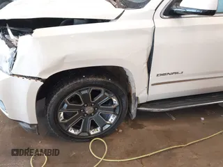 2015 GMC Yukon XL Denali with VIN 1GKS2JKJXFR528927, listed as a IAAI auction lot 41391259 with 159,467 mi miles. Bid and sale history available at carsss.com. Image 6.
