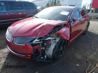 2015 Lincoln MKZ z VIN 3LN6L2G94FR619447, wystawiony jako IAAI lot #41831679 z przebiegiem 97 906 mil mil oraz . Historia ofert i sprzedaży dostępna na DreamBid. Obrazek 6.