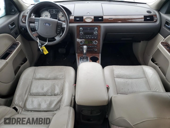2008 Ford Taurus Limited with VIN 1FAHP25W18G114475, listed as a Copart auction lot 43776945 with 85,782 mi miles and Salvage Title. Bid and sale history available at DreamBid. Image 8.