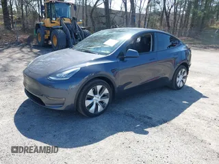 2021 Tesla Model Y Long Range with VIN 5YJYGDEE4MF119249, listed as a IAAI auction lot 41764711 with 87,796 mi miles. Bid and sale history available at carsss.com. Image 2.