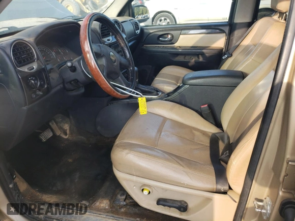 2007 GMC Envoy SLT with VIN 1GKDS13S972295861, listed as a Copart auction lot 74143314 with 167,332 mi miles and Salvage Title. Bid and sale history available at carsss.com. Image 7.