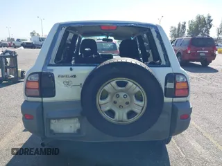 1999 Toyota RAV4 with VIN JT3GP10V2X7064915, listed as a IAAI auction lot 41998544 with 302,351 mi miles and . Bid and sale history available at DreamBid. Image 16.