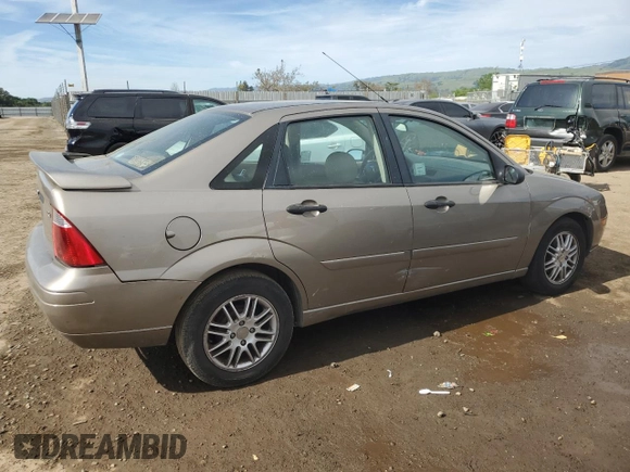 2005 Ford Focus S with VIN 1FAFP34NX5W263944, listed as a Copart auction lot 52973945 with 201,348 mi miles and Salvage Title. Bid and sale history available at carsss.com. Image 3.
