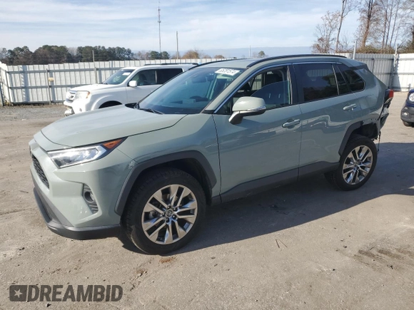2020 Toyota RAV4 XLE Premium with VIN 2T3C1RFV6LW059183, listed as a Copart auction lot 85281574 with 91,402 mi miles and Salvage Title. Bid and sale history available at carsss.com. Image 1.