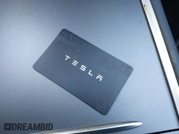 2022 Tesla Model Y Long Range with VIN 7SAYGDEE2NF440548, listed as a IAAI auction lot 41360276 with 19,714 mi miles and . Bid and sale history available at carsss.com. Image 11.