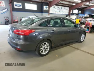 2015 Ford Focus SE with VIN 1FADP3F2XFL249619, listed as a Copart auction lot 63705825 with 118,573 mi miles and Clean title. Bid and sale history available at DreamBid. Image 3.