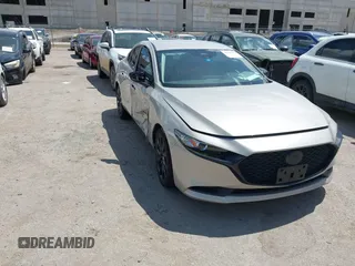 2024 Mazda 3 S Select Sport with VIN 3MZBPABM0RM412596, listed as a IAAI auction lot 42623921 with 19,920 mi miles and . Bid and sale history available at DreamBid. Image 1.