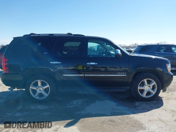 2013 Chevrolet Tahoe LTZ with VIN 1GNSKCE0XDR350970, listed as a IAAI auction lot 41704253 with 126,653 mi miles and . Bid and sale history available at DreamBid. Image 14.