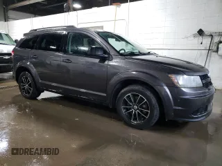 2017 Dodge Journey SE z VIN 3C4PDCAB5HT682795, wystawiony jako Copart lot #57478495 z przebiegiem 120 355 mil mil oraz Czysty tytuł • Clean title. Historia ofert i sprzedaży dostępna na DreamBid. Obrazek 4.