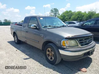 2002 Ford F-150 XL with VIN 1FTRX17W22NA43571, listed as a IAAI auction lot 42697861 with Not provided miles and . Bid and sale history available at DreamBid. Image 1.