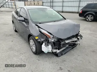 2021 Toyota Prius L Eco with VIN JTDKAMFU8M3130779, listed as a Copart auction lot 56452395 with 86,094 mi miles and Salvage title. Bid and sale history available at DreamBid. Image 14.