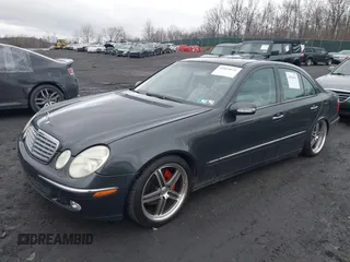 2003 Mercedes-Benz E 500 with VIN WDBUF70J73A189907, listed as a IAAI auction lot 41824651 with 126,466 mi miles and . Bid and sale history available at DreamBid. Image 2.
