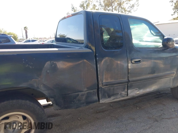 2000 Ford F-150 XL with VIN 1FTRX17W3YNB90314, listed as a IAAI auction lot 41825498 with 369,372 mi miles. Bid and sale history available at carsss.com. Image 13.