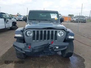 2020 Jeep Wrangler Unlimited Rubicon z VIN 1C4HJXFG7LW193665, wystawiony jako IAAI lot #41874930 z przebiegiem 58 884 mil mil oraz . Historia ofert i sprzedaży dostępna na DreamBid. Obrazek 12.