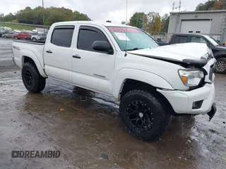 2014 Toyota Tacoma with VIN 3TMLU4EN9EM140999, listed as a IAAI auction lot 37765514 with 168,875 mi miles. Bid and sale history available at carsss.com. Image 1.