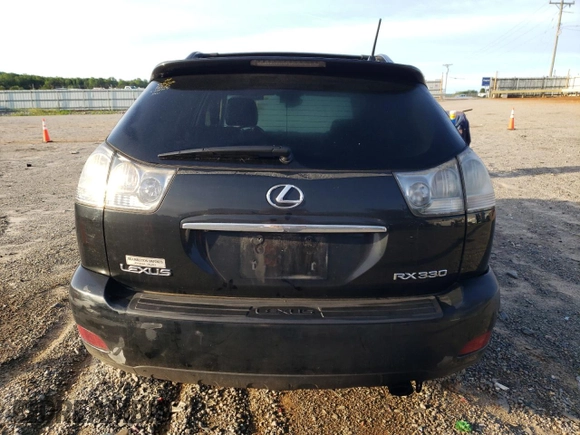 2006 Lexus RX 330 with VIN 2T2HA31U26C096680, listed as a Copart auction lot 57435695 with 228,457 mi miles and Salvage title. Bid and sale history available at DreamBid. Image 6.