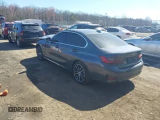 2021 BMW 3 Series 330i xDrive with VIN 3MW5R7J00M8B97750, listed as a IAAI auction lot 41810399 with 60,771 mi miles and . Bid and sale history available at DreamBid. Image 3.