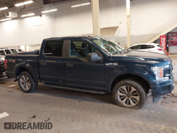 2018 Ford F-150 XL with VIN 1FTEW1EPXJKE93689, listed as a IAAI auction lot 41710693 with 117,065 mi miles. Bid and sale history available at carsss.com. Image 13.