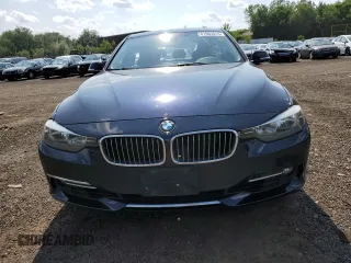 2015 BMW 3 Series 328i xDrive with VIN WBA3B5G50FNS16915, listed as a Copart auction lot 61603915 with 137,059 mi miles and Salvage title. Bid and sale history available at DreamBid. Image 5.